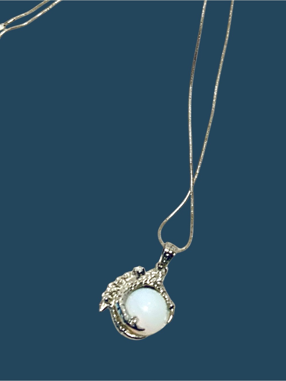 Silver Eagle Claw Pendant Necklace featuring an Opalite Center.  Handmade.